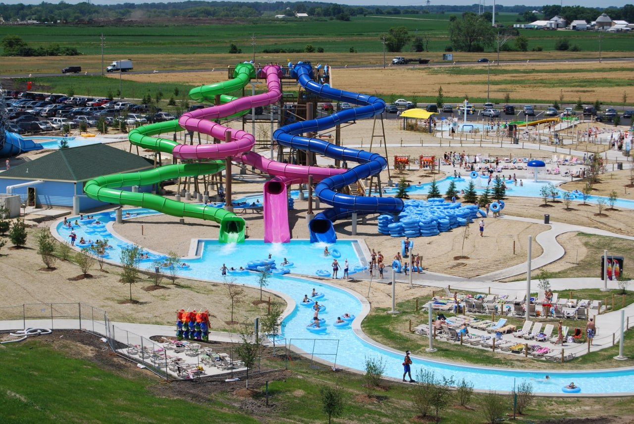 Aerial view of a water park with slides and wave pool